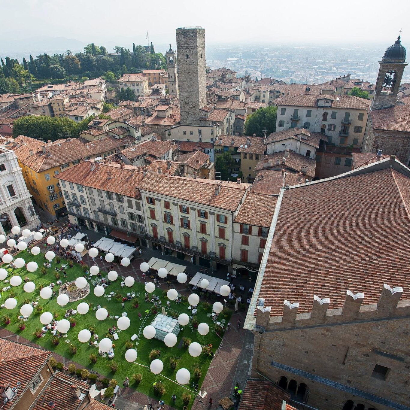 The Piazza is crowned with a roof of white dancing balloons